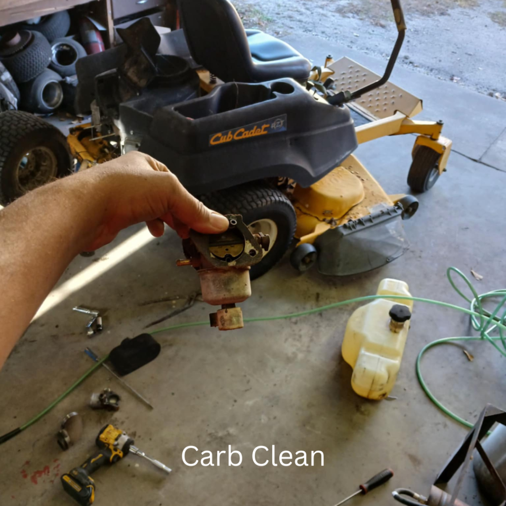 Cleaning a carburetor on a lawn mower